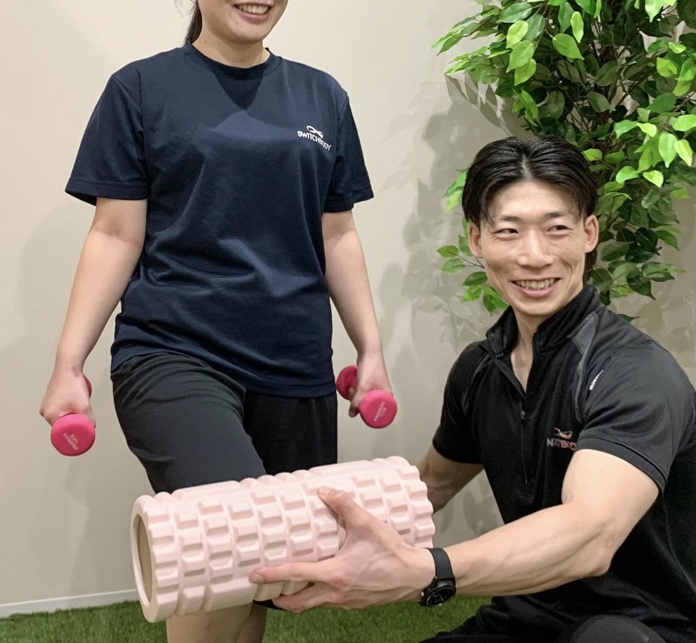 ダイエット開始1ヶ月頃のK様とトレーナー