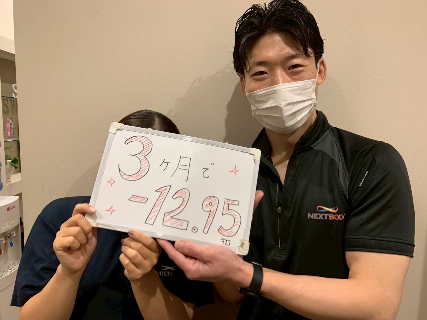 ダイエット開始2ヶ月頃のK様とトレーナー